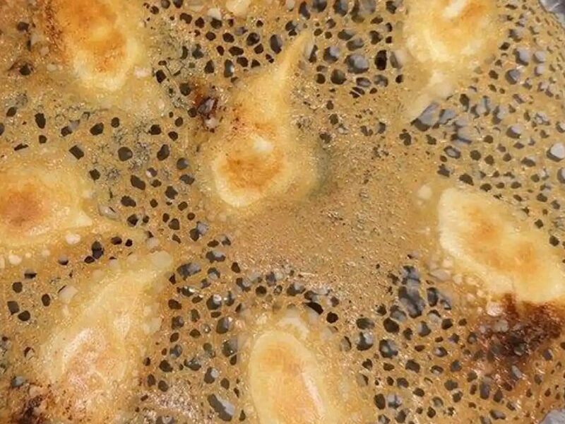 Pan-fried dumplings with a golden lace crust